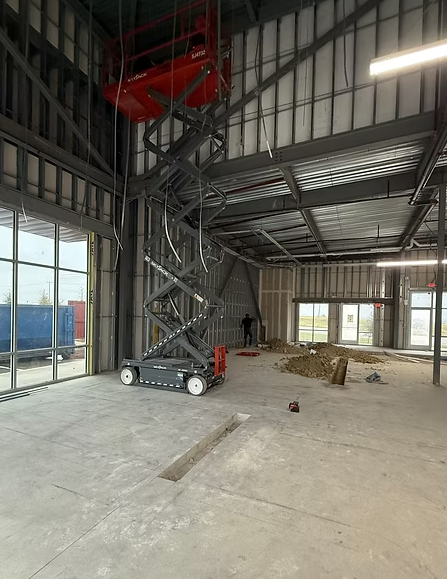 Comparison of a construction site and a finished interior space with text overlay.